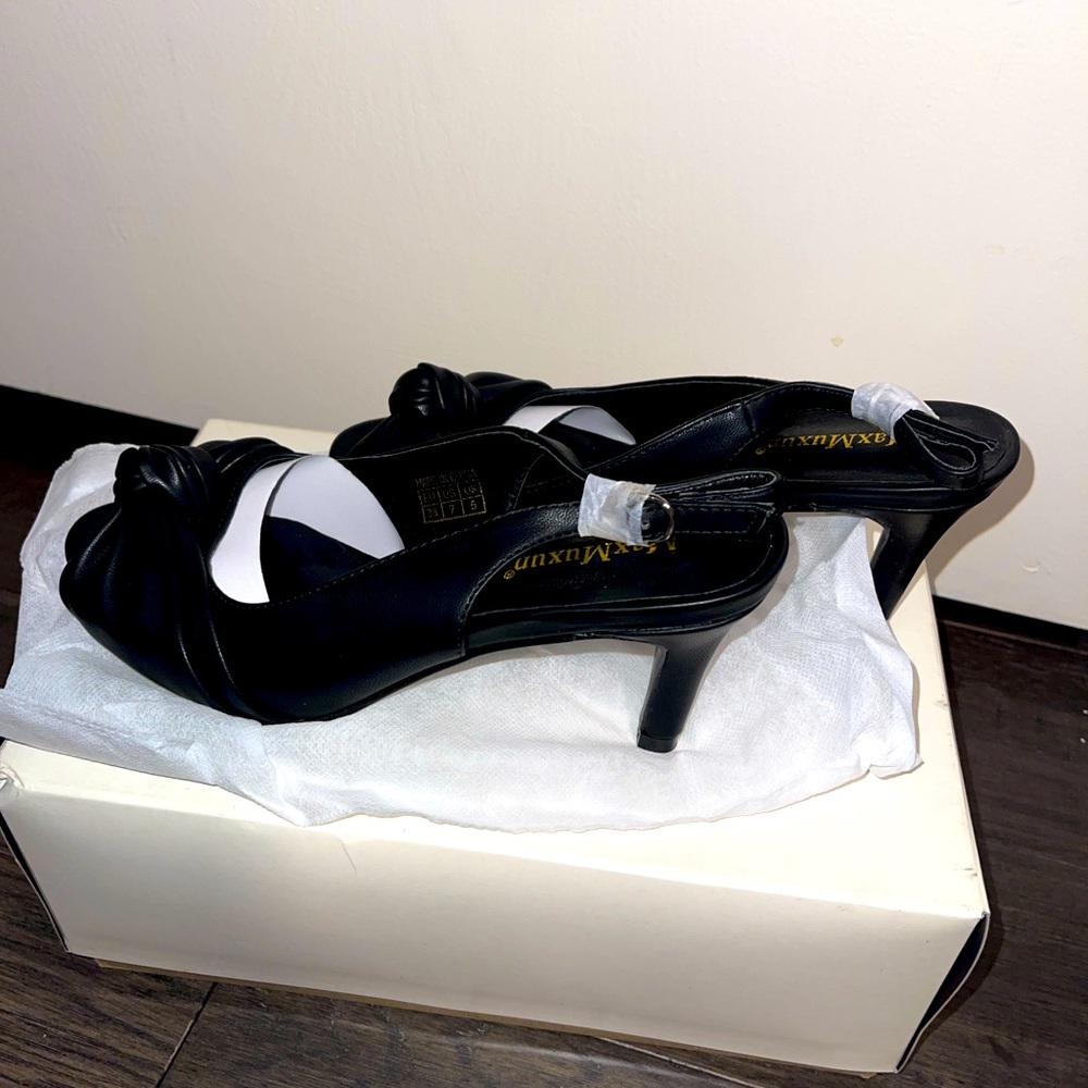 Brand new, never worn black peep toe slingback heels
